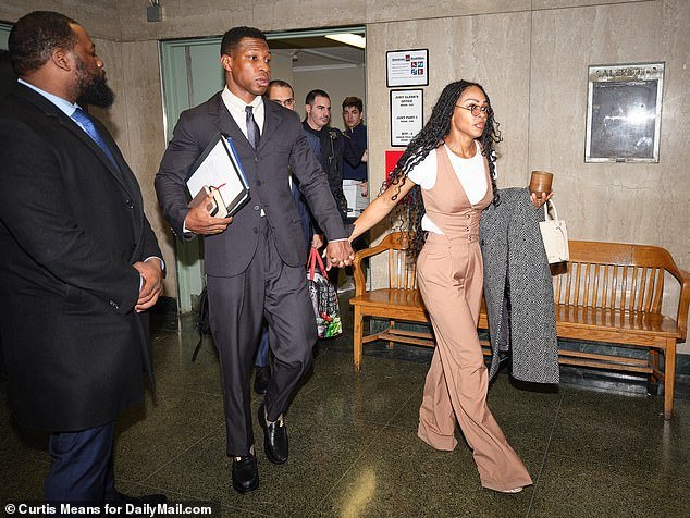 Actor Jonathan Majors will be seen with girlfriend Meagan Good during his criminal trial in Manhattan on Friday.  He is accused of assaulting ex-girlfriend Grace Jabbari