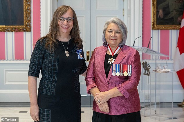 Morgane Oger (left), a transgender woman, received a Meritorious Service Medal from Canadian Governor General Mary Simon (right)