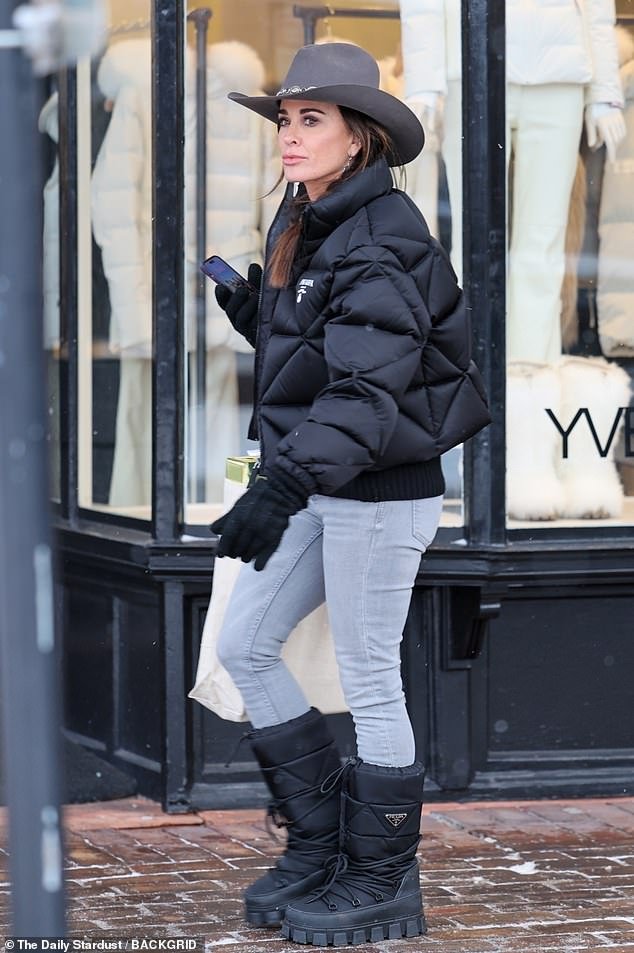 Kyle Richards, 54, did some shopping while wearing a Prada puffer over a Prada sweater with light gray jeans and black Prada snow boots
