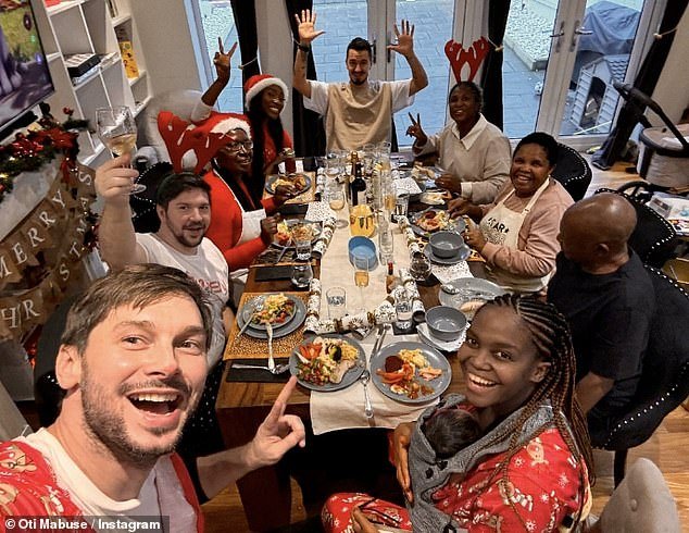 Oti Mabuse (front right) shared some sweet snaps as she became a first-time mother and cradled her husband Marius Lepure's newborn daughter - after announcing their new arrival on Christmas Day