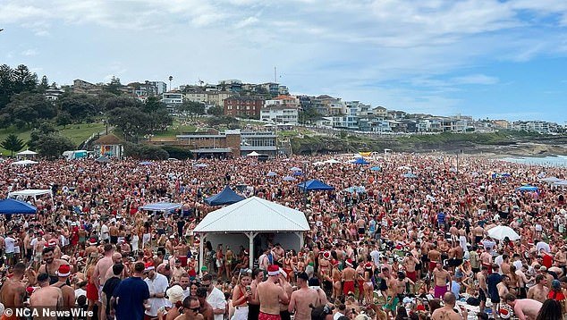 Thousands of partygoers flocked to the iconic Bronte Beach for Christmas Day celebrations in the sunshine