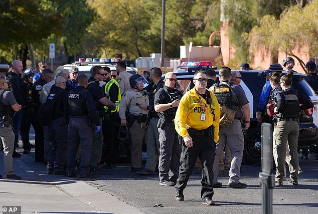 The associate professor was killed Wednesday morning when gunman Tony Polito went on the rampage on the UNLV campus, where police are seen at the scene of the university shooting.
