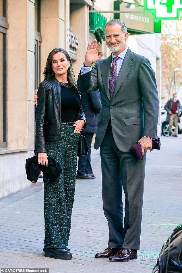King Felipe and his wife Letizia, both pictured today dressed stylishly in Madrid, took part in the birthday festivities