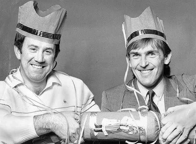 Even Christmas could bring rivals together with Everton legend the late Howard Kendall (left) pulling a cracker with Sir Kenny Dalglish when they managed the Merseyside clubs