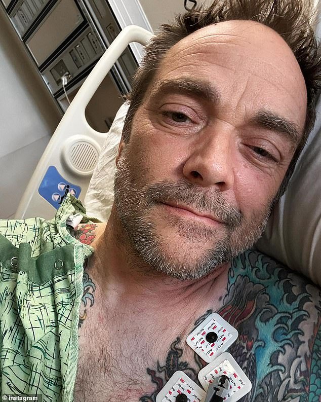 Sheppard posted a selfie on Saturday as he lay in a hospital bed with several heart monitoring devices attached to his chest as he shared the news of his near-death experience