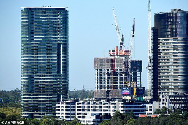 Property investors are at greater risk of losing money if they buy a high-rise property in certain parts of Australia's most populous cities (pictured is Sydney Olympic Park near Parramatta)