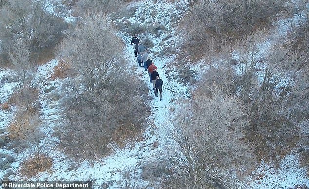 Authorities climbed the cold mountainside as they searched for the teenager who was found 