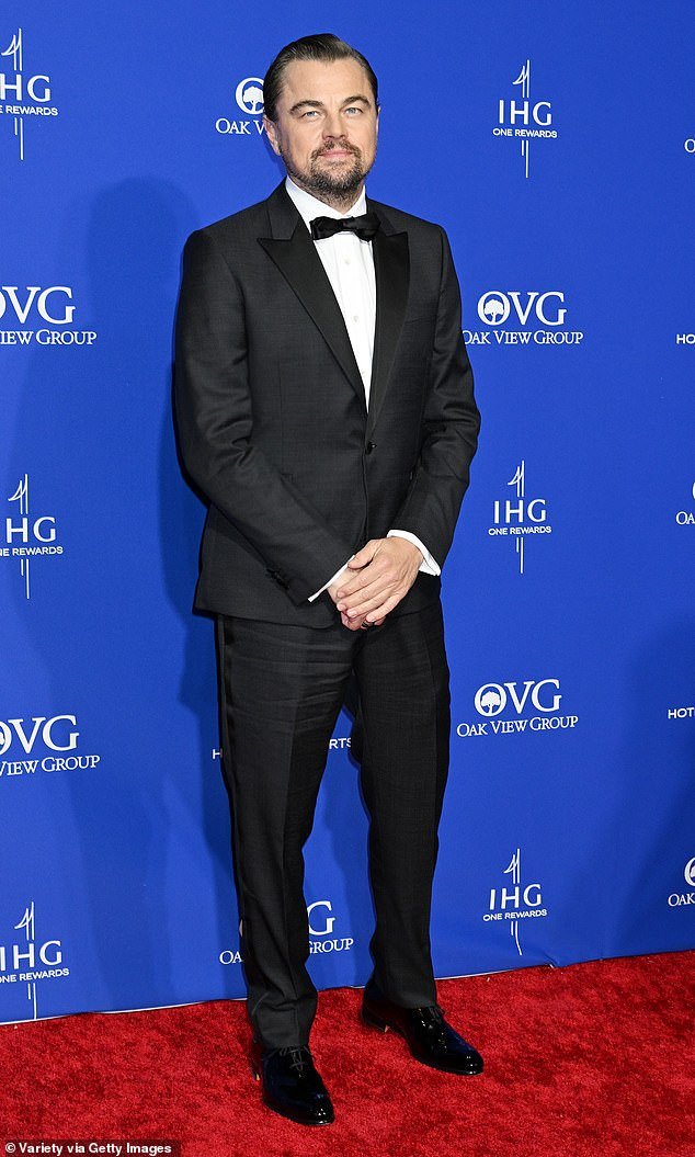 DiCaprio, 49, looked typically handsome in a black tuxedo paired with a white shirt and black bow tie