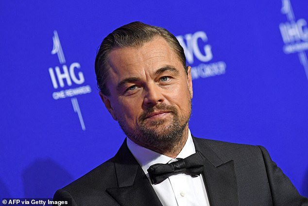 Leo looked dapper, with his hair slicked back and his beard neatly trimmed