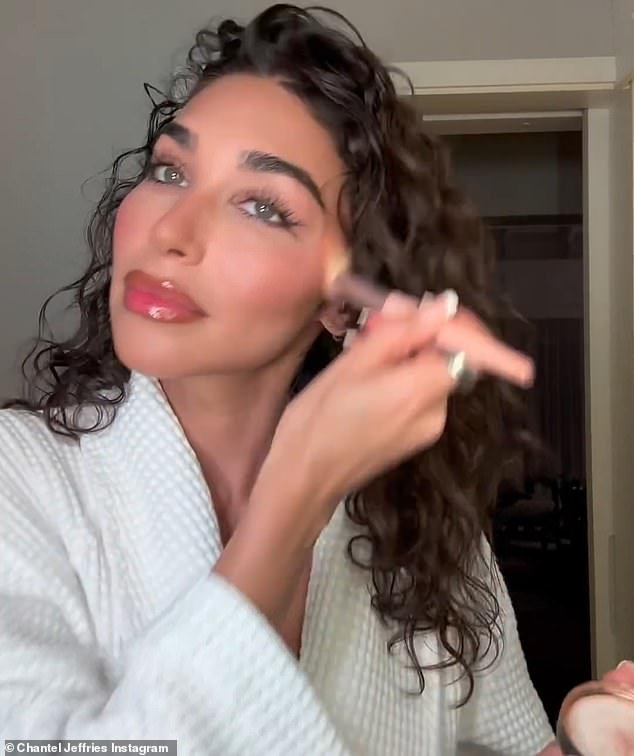 A short video clip in the post showed her applying makeup to her sun-kissed complexion