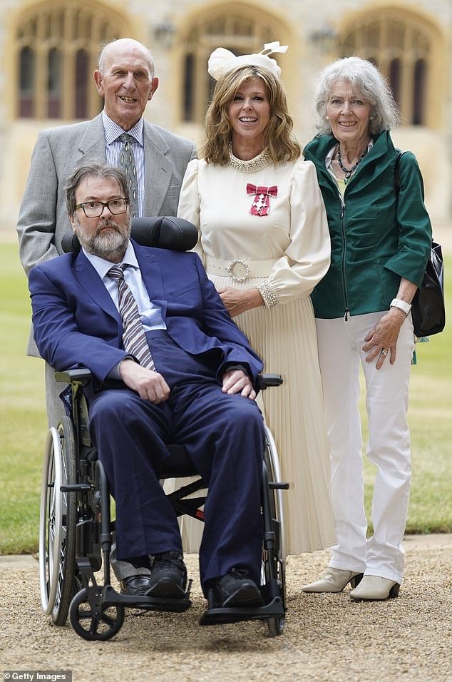 Derek supported his wife when she was awarded an MBE for her services to journalism in June last year (pictured in June with Kate's parents Gordon and Marilyn after his wife collected her MBE)