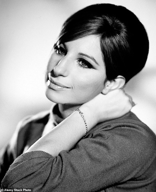 Elsewhere in her book, Barbra also revealed why she never had a nose job - after receiving cruel comments about her appearance during her early career;  pictured around 1965