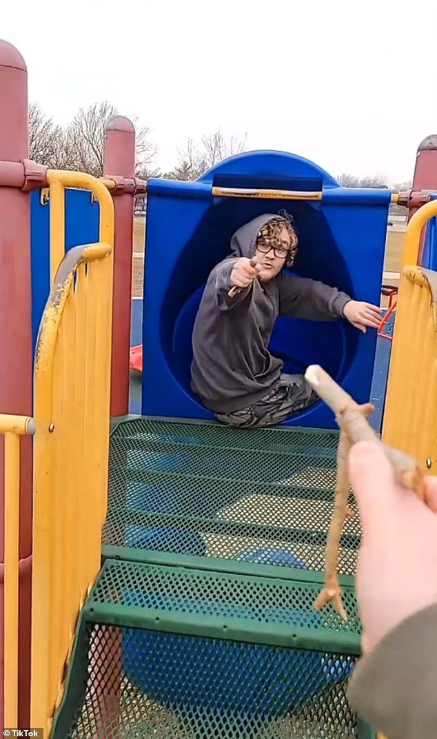 In December, just weeks before the shooting, Butler posted another video to the same social media account of himself sitting on the children's playground equipment with a friend and pretending to be in a gunfight with sticks.