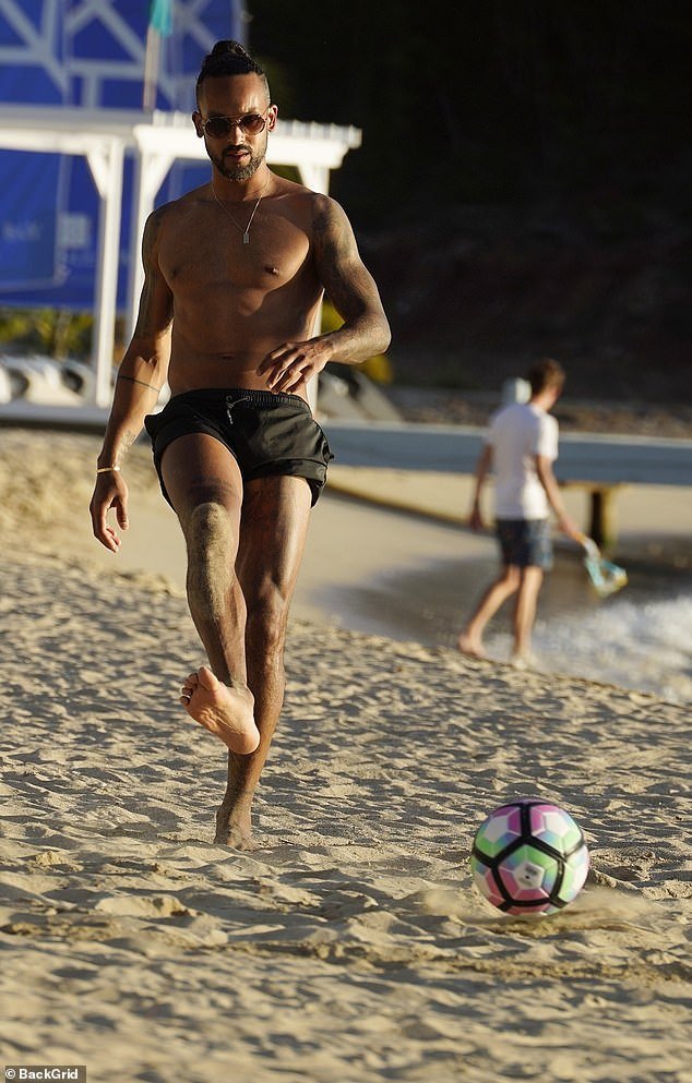 He was seen kicking the ball around as he made sure to play some football during the beach day