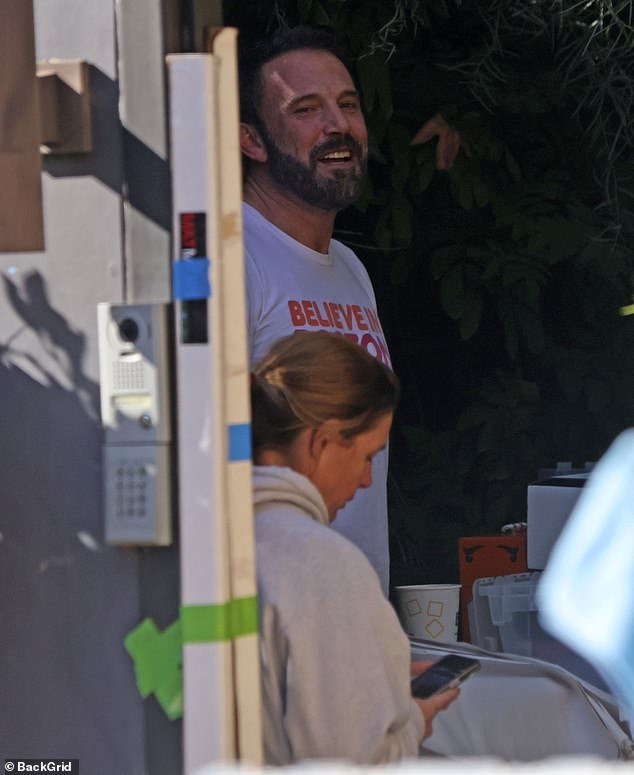 Ben was seen wearing a white T-shirt with 'Believe in Boston' written in pink and orange.  Although he had a McDonald's cup, there were many Dunkin' cups visible on set