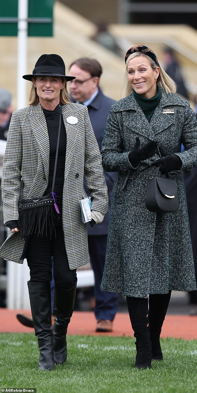 Sense of humour: Dolly Maude (left), appeared at Cheltenham Racecourse with her best friend wearing a badge with the words 'Lady in Waiting'