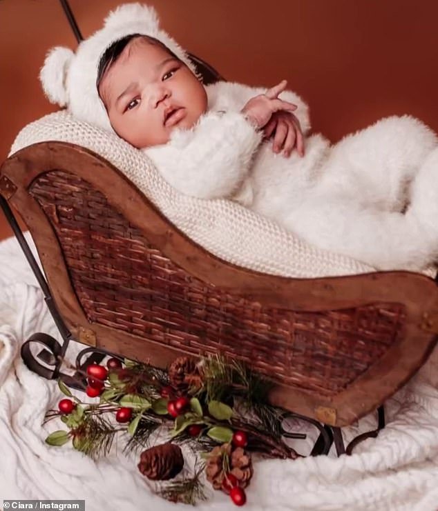 She was placed in a wicker cradle for part of the shoot and in a small carriage decorated with leaves at another point.