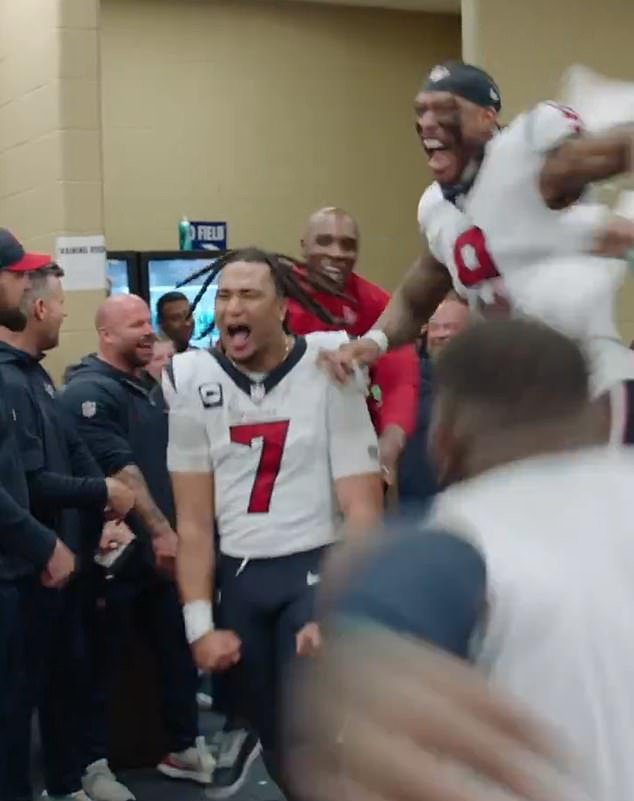 A jubilant Texans locker room celebrated their achievement after the game was won