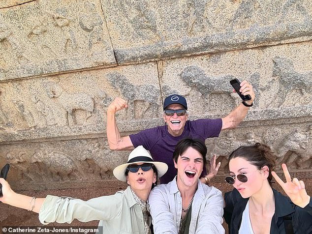 The couple recently got playful with their son Dylan, 23, and daughter Carys, 20, during their travels together in India