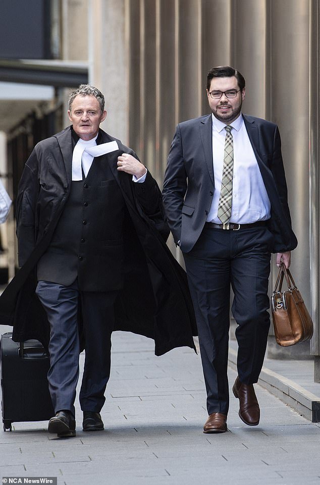 Bruce Lehrmann, right, is pictured walking with his lawyer Steven Whybrow SC to the Federal Court for his defamation trial against Network Ten