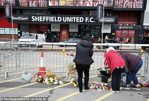 Floral tributes in club colors were left by well-wishers in memory of Maddy at the Blades ground after her death was announced last year