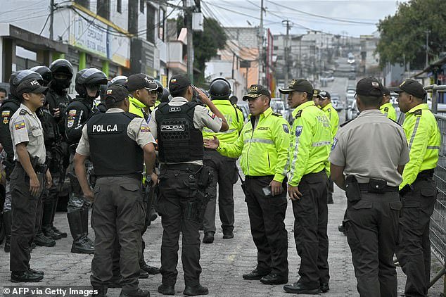 Police forces, backed by the military, prepare to carry out a security operation after incidents at El Inca prison in Quito on January 8