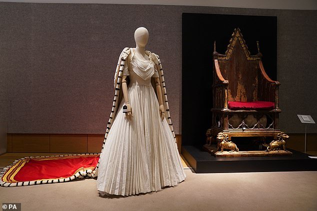 Pictured: A replica of Queen Elizabeth II's coronation dress and the coronation chair used in season one