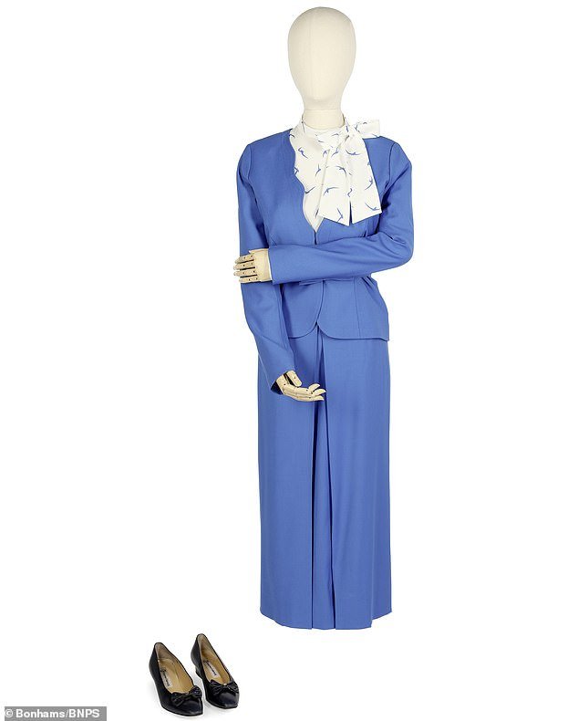 Replica of Princess Diana's bright blue engagement outfit has been valued by the Crown at £2,000