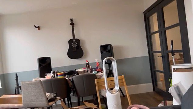 During a video tour of her apartment, she showed her guitar on the wall and said she was writing new songs