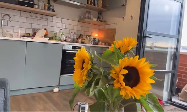 She said she was happy to be home in London and showed fans sunflowers from a friend