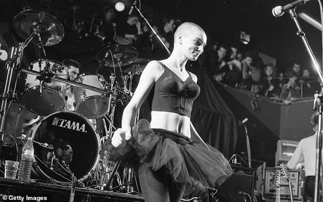 She added: “We were one soul in two halves.  He was the only person who ever loved me unconditionally.”  Pictured: Sinead O'Connor on stage at the Olympic Ballroom, Dublin, in March 1988
