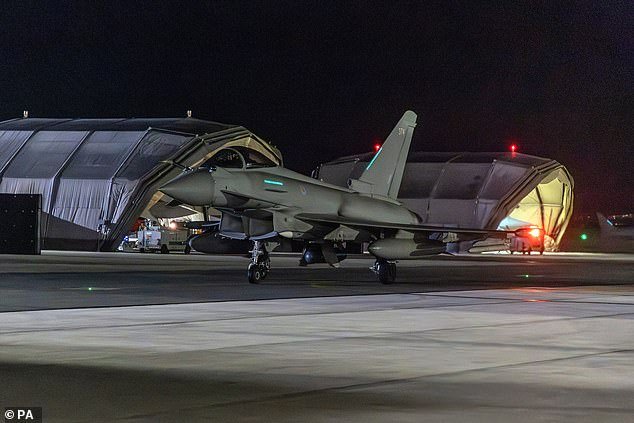 One of four RAF Typhoon aircraft returning to RAF Akrotiri in Cyprus after joining the US-led coalition that carried out air strikes on military targets in Yemen on Friday