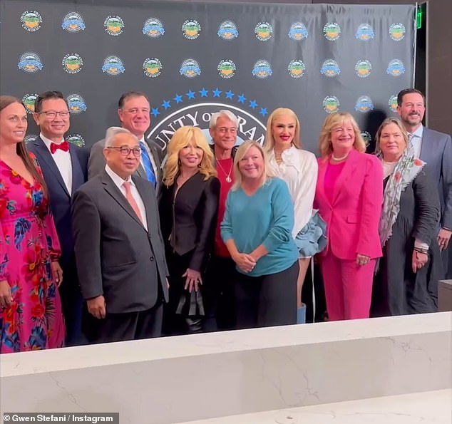 Stefani also posed with some district officials and some other insiders