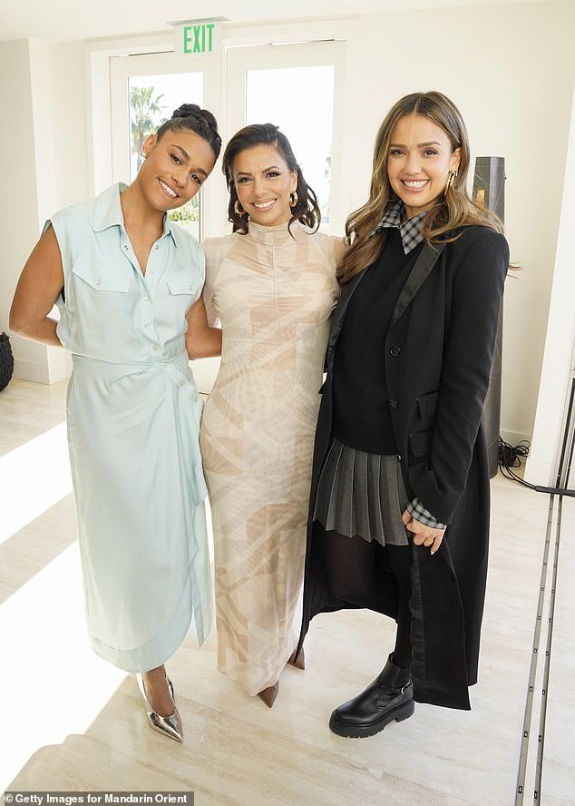 Inside the venue, Longoria and DeBose posed for a photo with Jessica Alba, who donned a stylish all-black ensemble.  The Honey star, 42, wore a black sweater with a flannel collar poking out and a gray pleated mini skirt