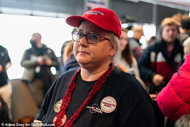 Amy Meyer, 51, is a data analyst from Urbandale, Iowa, supporting Florida Governor Ron DeSantis during Monday's caucus.  She told DailyMail.com during a campaign stop in West Des Moines on Saturday that she does not support Haley because of her identity politics.  