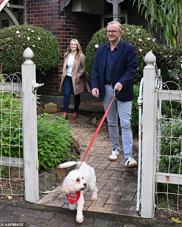 Prime Minister Anthony Albanese (pictured with his partner Jody Haydon and his dog Toto) is accused of distancing himself from the failed Voice referendum
