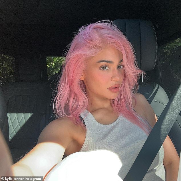 The socialite showed off her newly dyed pink hair in a series of selfies posted to her Instagram