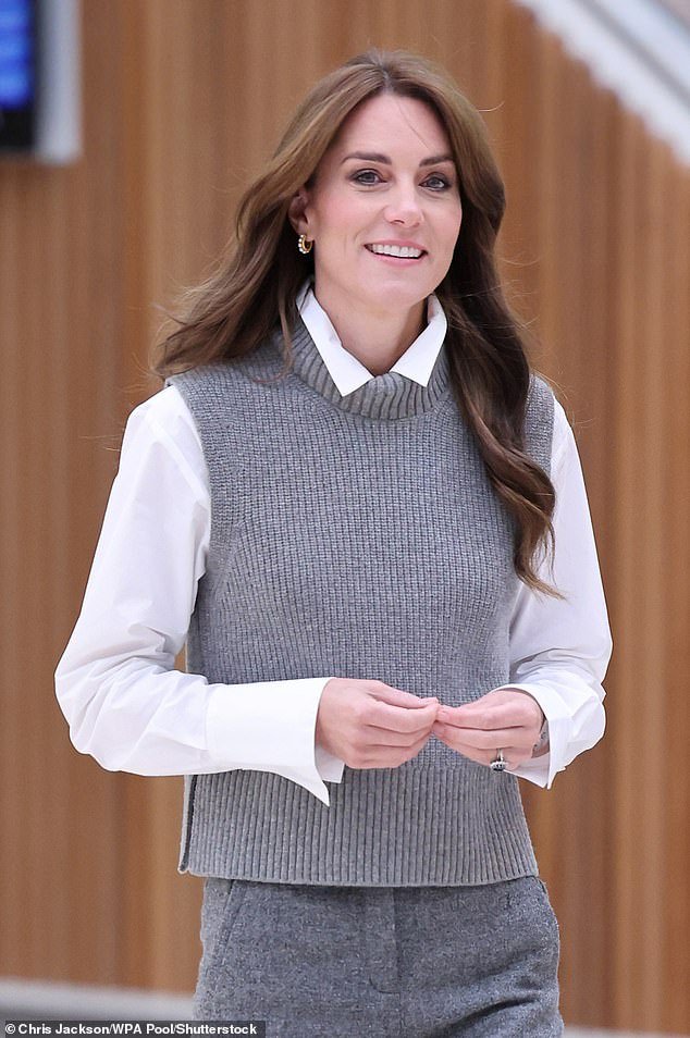 Kate (pictured in October) is being treated in hospital after successful abdominal surgery, Kensington Palace announced today