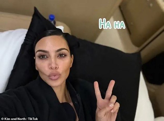 Kim could also be seen sharing a photo of herself pursing her lips at the camera while also flashing a peace sign