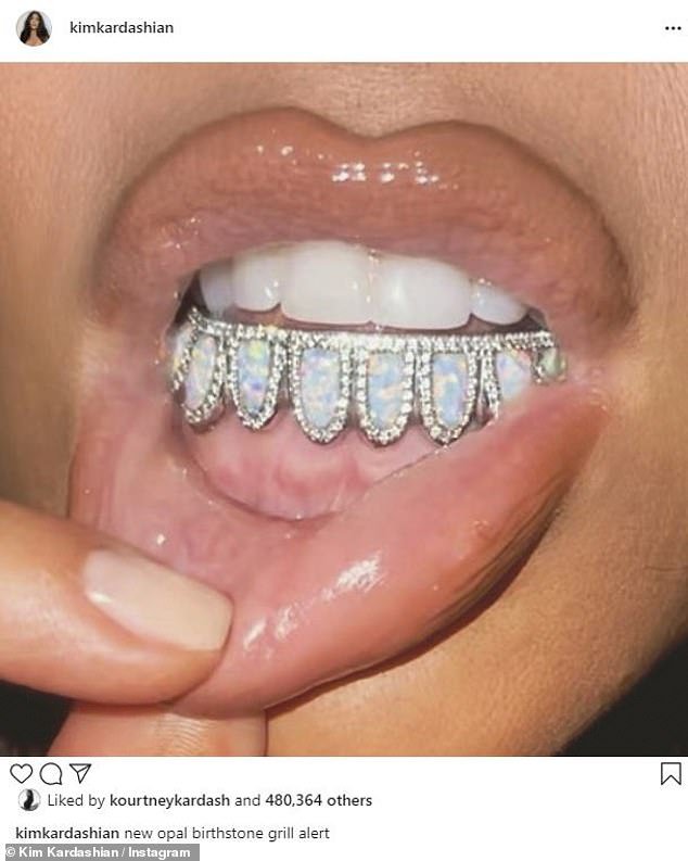 However, North isn't the only one to have worn a grill in the Kardashian family - with Kim showing off her own dental jewelery in the past