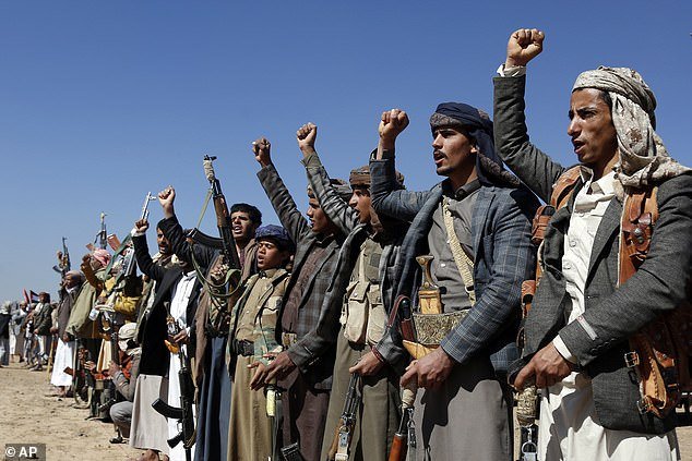 Houthi rebels are pictured at a rally near Sanaa, Yemen on Sunday