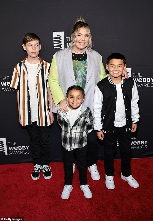 Lowry with her sons Isaac, Lincoln and Lux ​​in 2023