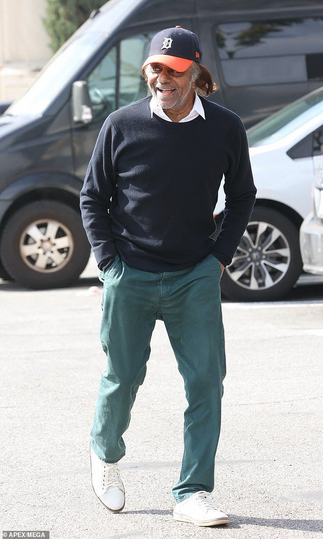 The Chances Are crooner seemed to be in fantastic shape as he dressed youthfully in a casual-cool style in green jeans, a black sweater over a white shirt and bright white sneakers