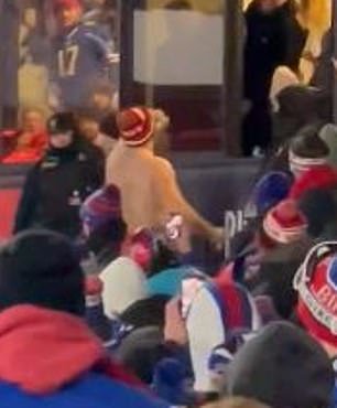 Jason then drank a beer in front of the Bills fans before climbing back into the suite