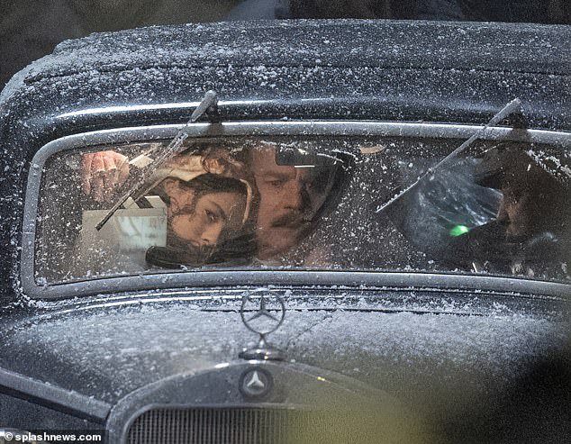 Ewan appeared panicky as he sat in the vintage Mercedes with the actress