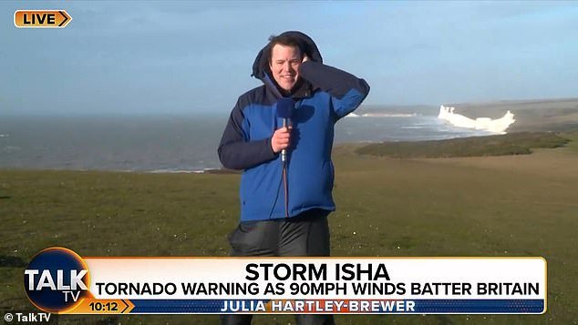 But Ms Hartley-Brewer expressed her concern for the reporter, as she said: 'You're desperately wiggling and trying to stay upright in the incredible wind'