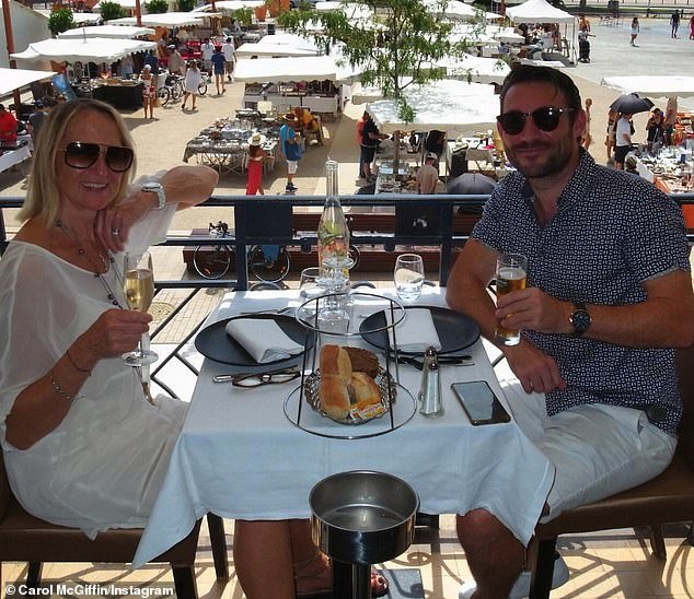 She has been enjoying a lovely relaxing holiday with her husband since leaving the show (pictured with husband Mark Cassidy, 41)