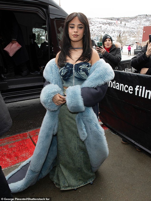 When she arrived at the premiere of the film directed by Chiwetel Ejiofor, 46, she also wore a furry, sky blue, floor-length coat that artfully slid down to show off her sculpted shoulders.