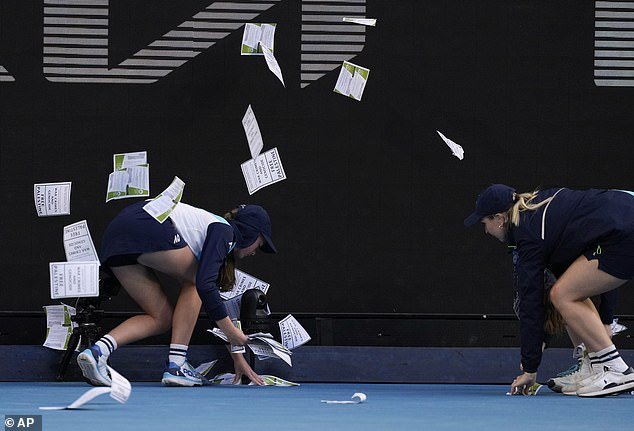 A woman threw leaflets at Margaret Court Arena during the fourth round of the Australian Open on Monday