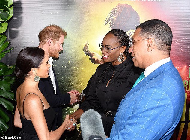 Prince Harry and Meghan with Jamaican Prime Minister Andrew Holness and his wife Juliet